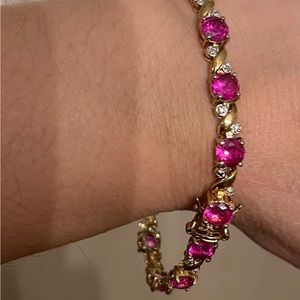 Lab created pink sapphire tennis bracelet. Silver 925 with gold overlay.